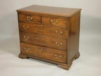 A George III mahogany chest of two short and three long drawers