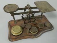 A set of mahogany and brass postal scales