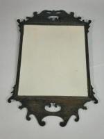 An 18thC stained walnut fret frame mirror