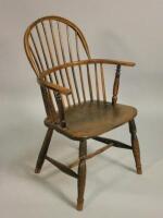 A mid 19thC ash and elm Windsor open armchair