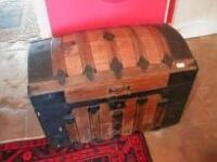 A 19thC. dome top trunk with ornate metalwork