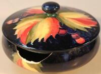 A William Moorcroft Leaf and Berry pattern jar and cover