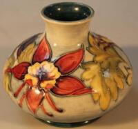 A Walter Moorcroft Columbine pattern vase