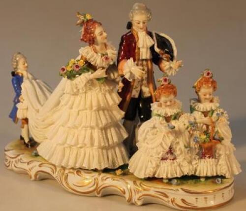 A Continental porcelain wedding figure group