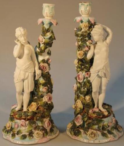 A pair of Sitzendorf candlesticks