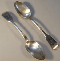 A pair of Victorian silver serving spoons