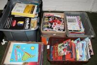 A quantity of football programmes