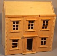 A wooden doll's house