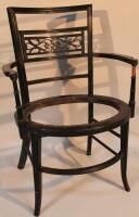 An Edwardian Arts & Crafts occasional chair