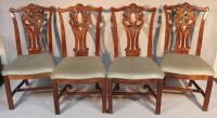 A set of four Chippendale style dining chairs