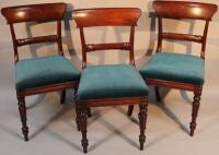 A set of three Victorian mahogany dining chairs