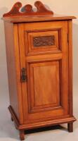 A late Victorian mahogany bedside cabinet