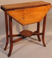 An Edwardian mahogany Sutherland table