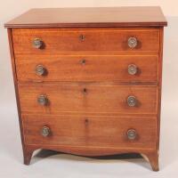 A mahogany commode