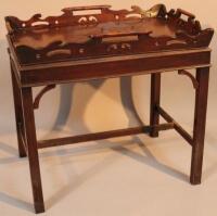 A George III style mahogany tray top table