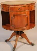 A mid 20thC mahogany revolving bookcase