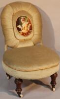 A late Victorian mahogany nursing chair