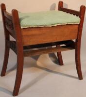 A Victorian mahogany piano stool