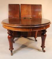 A late 19thC walnut extending dining table