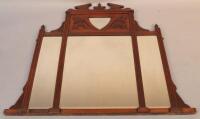 An Edwardian mahogany over mantel mirror