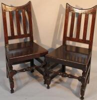 A pair of Edwardian oak side chairs