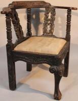 A 19thC oak corner chair