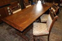 A matched oak refectory table and four Edwardian dining chairs