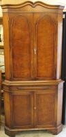 A Queen Anne design walnut veneered corner cupboard