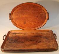 An Edwardian oak tray