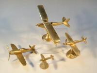 A quantity of brass model aeroplanes