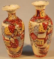 A pair of Meiji period satsuma vases with flared rims of shouldered form