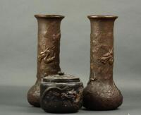 A red earthenware Chinese style jar and cover