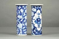 A pair of Chinese blue and white cylindrical vases