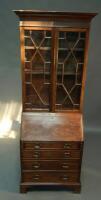 A Georgian oak bureau bookcase