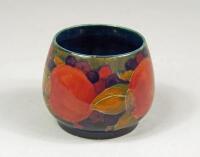 A Moorcroft Pomegranate pattern small bowl