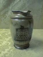 A Royal Doulton stoneware ale jug