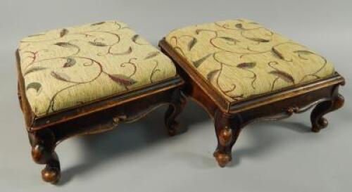 A pair of early Victorian mahogany foot stools