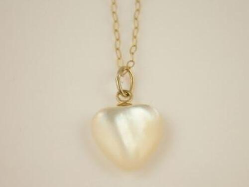 A heart pendant and chain