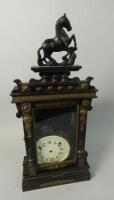 A late 19thC German ebonised mantel clock