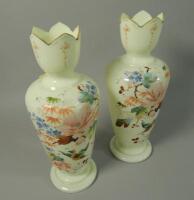 A pair of Victorian yellow opaque vases