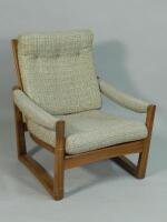 A 1960s-70s Retro style teak open armchair (AF). The upholstery in this lot does not comply with the