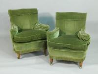 A pair of late Victorian Howard style small armchairs