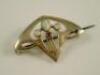 An early 20thC Art Nouveau style pierced brooch