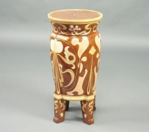 A late 19thC/early 20thC Art Nouveau majolica jardiniere stand