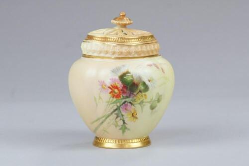 A Royal Worcester blush ivory urn shaped pot pourri vase and cover