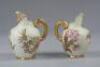 Two Royal Worcester graduated jugs