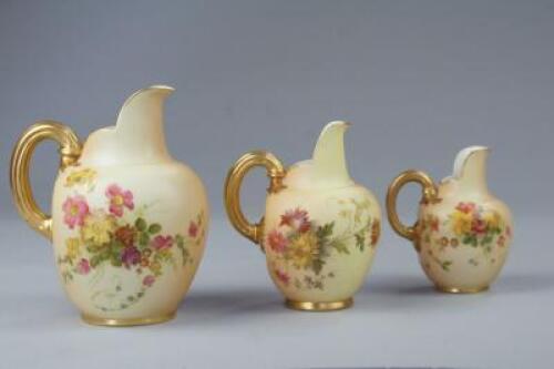 Three Royal Worcester graduated jugs