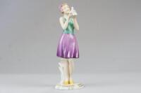 A Royal Dux Art Deco figure of a girl