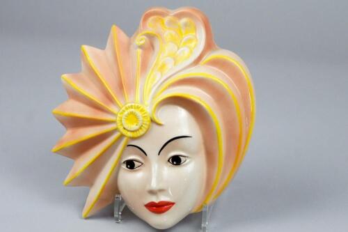 A Crown Devon pottery wall mask painted by Dorothy Ann