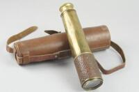 A WWII leather cased four draw brass telescope, marked TEL.SCT.REGT.MK.IIS with stamp BC Ltd and Co, 25637 O.S.126.G.A. 